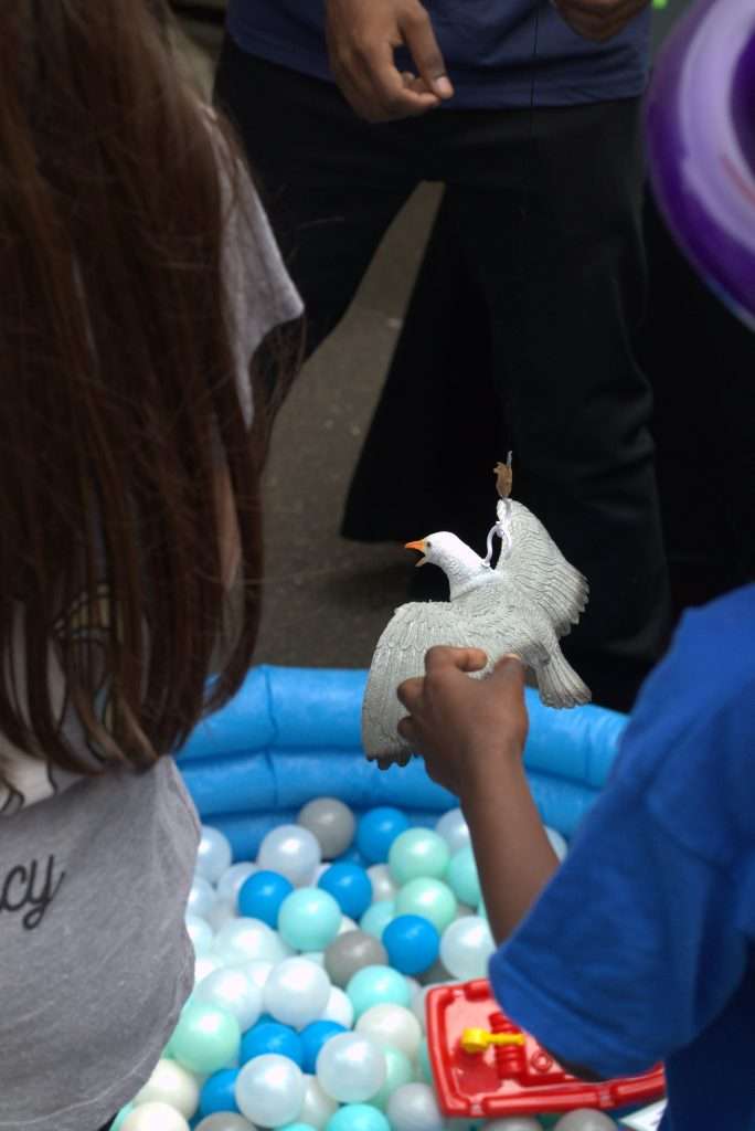 child engaging at a science fair